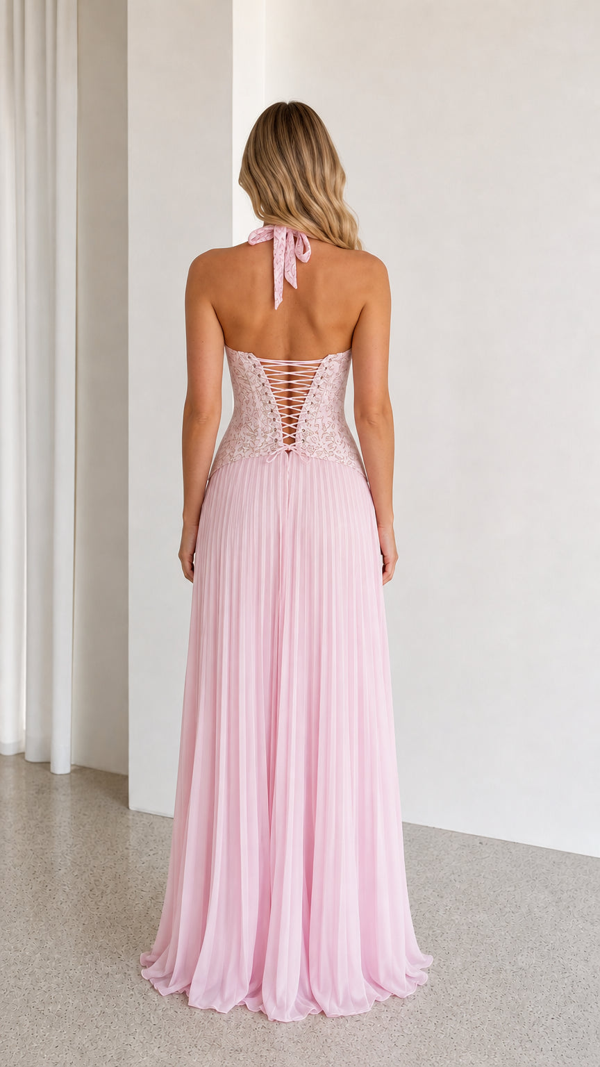 Pink maxi dress showing lace-up back detail