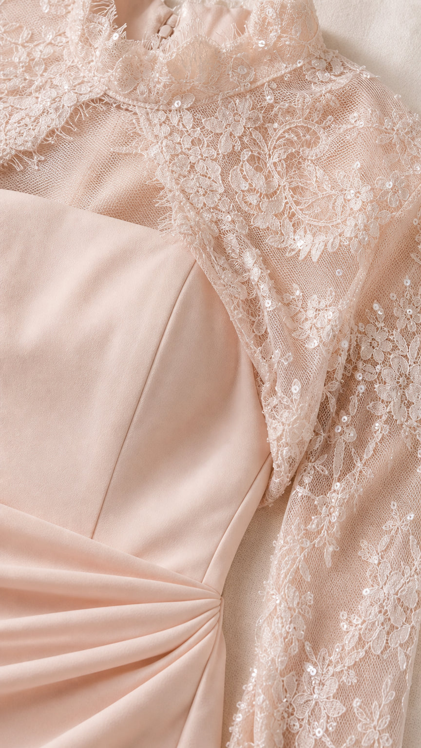 Close-up detail of lace bodice and textured fabric