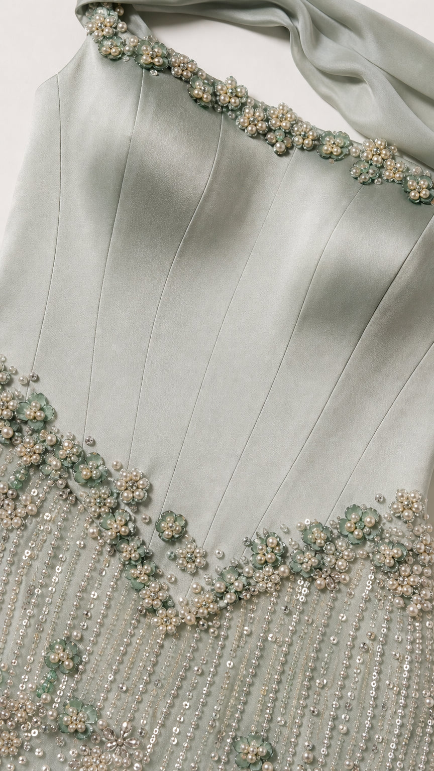 Close-up detail of bodice beadwork and crystal embellishments