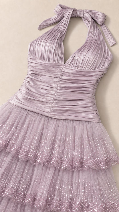 Close-up detail of halter neckline, ruched bodice, and tulle skirt