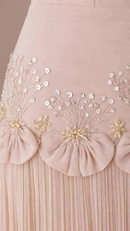 Close-up detail of embellished floral waist design