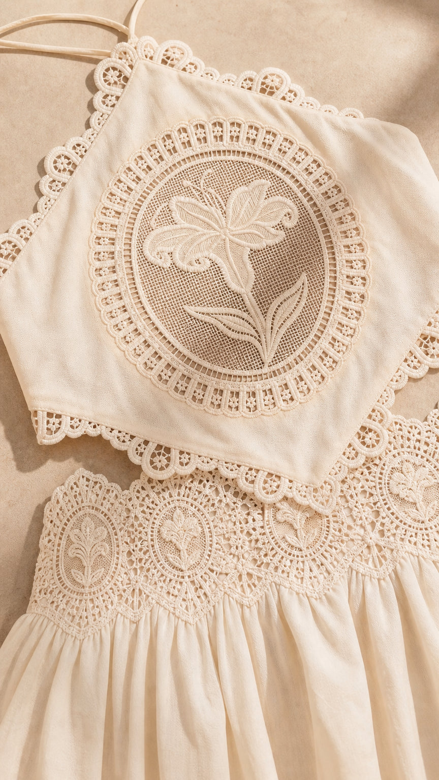 Close-up detail of the floral crochet lace halter top and waistband
