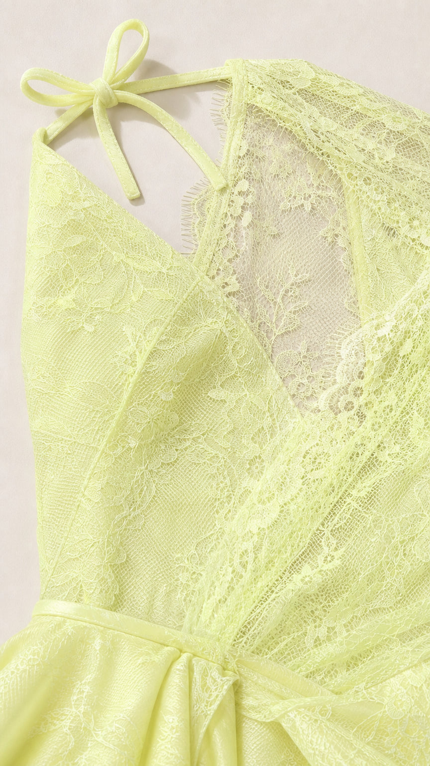 Close-up detail of sheer lace bodice and strap styling