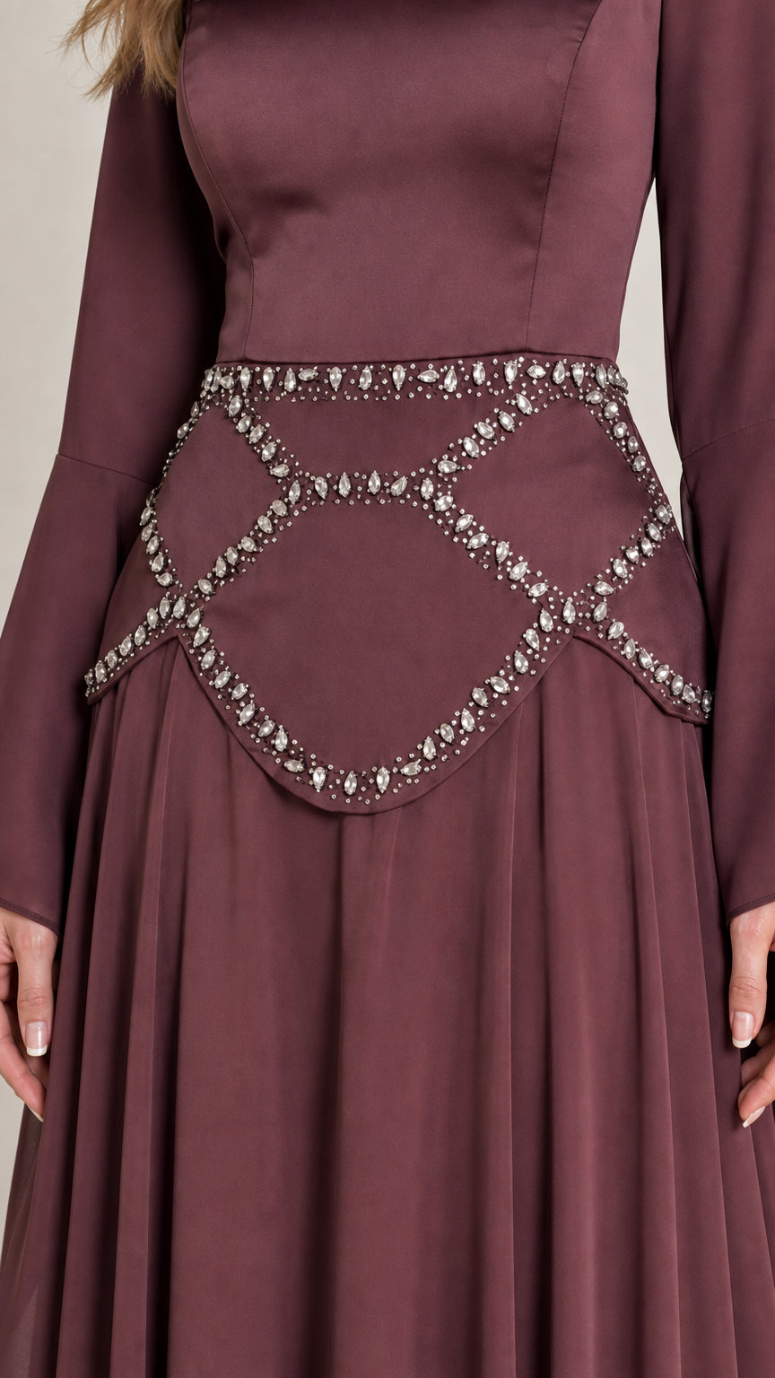 Close-up of crystal rhinestone waist belt and satin bodice
