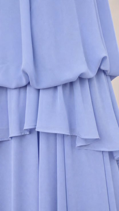 Close-up texture and tier detail of Light Blue flowy chiffon dress