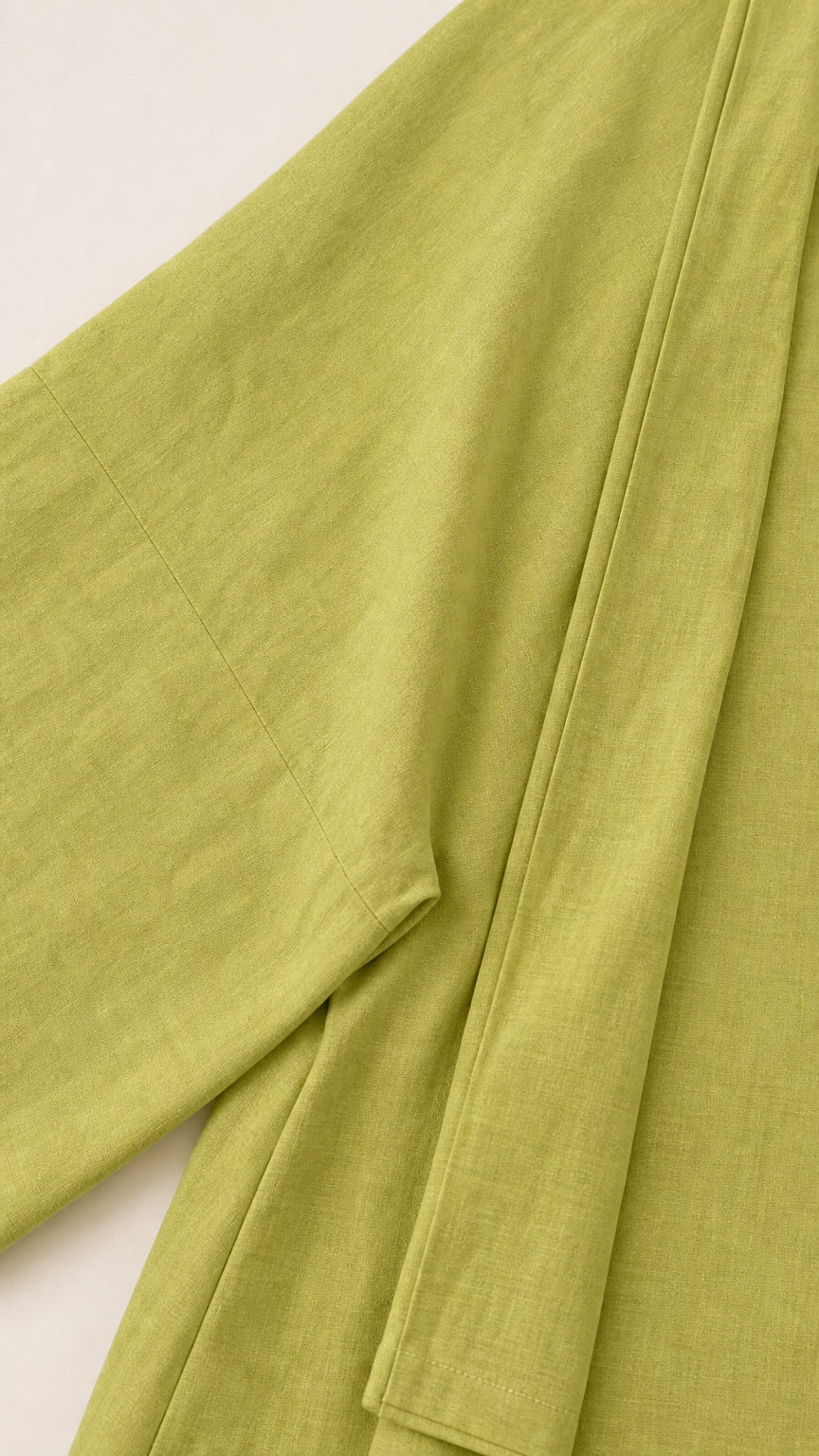 Close-up detail of textured linen-look weave fabric and clean seam construction