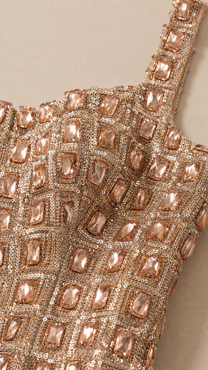 Close-up detail of faceted stone embellishments and wide straps