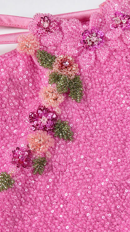 Close-up of floral beadwork and sequin texture