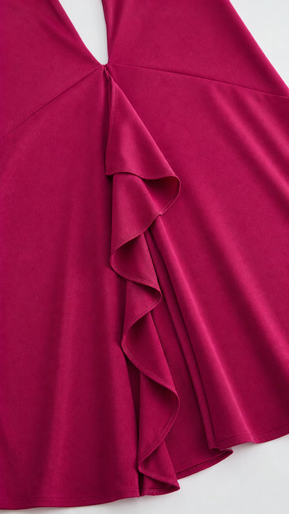 Close-up of front cascade ruffles on magenta dress