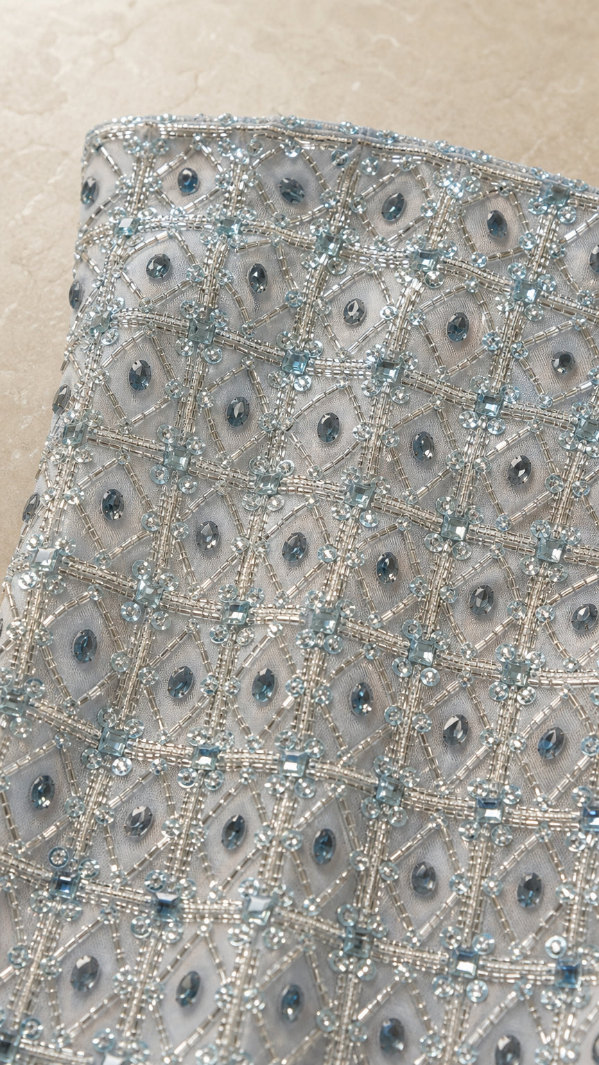 Close-up detail of geometric bead and sequin embellishments