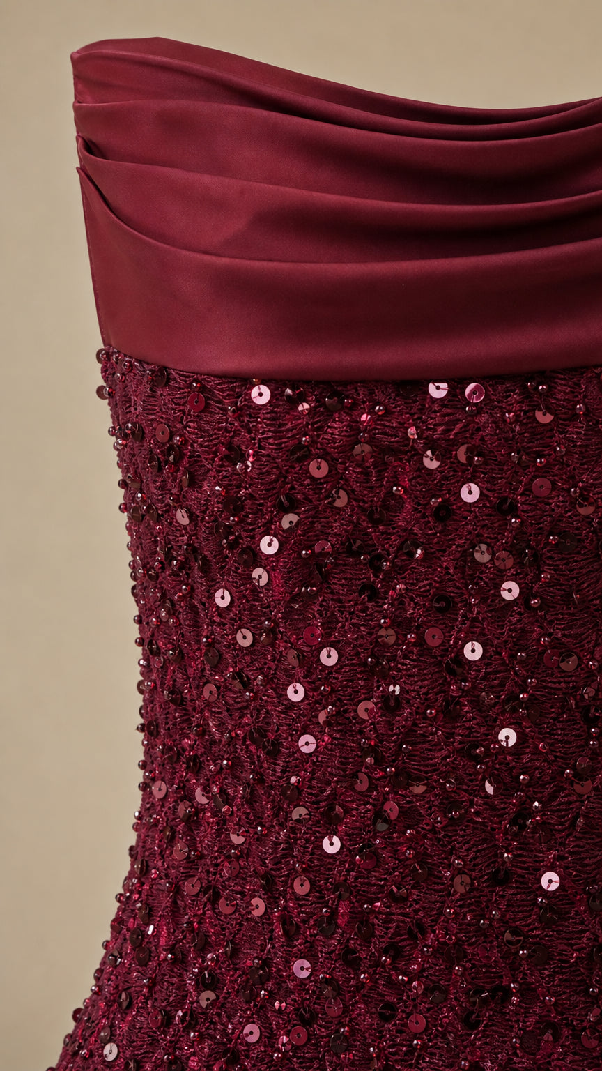 Close-up detail of satin draped bust and sequin texture