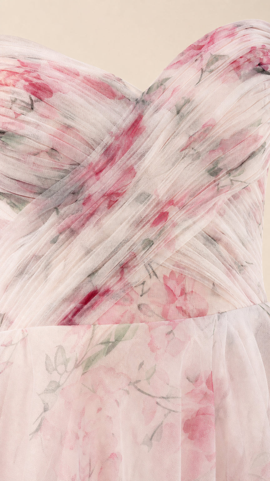 Close up view of the ruched sweetheart bodice and floral tulle fabric