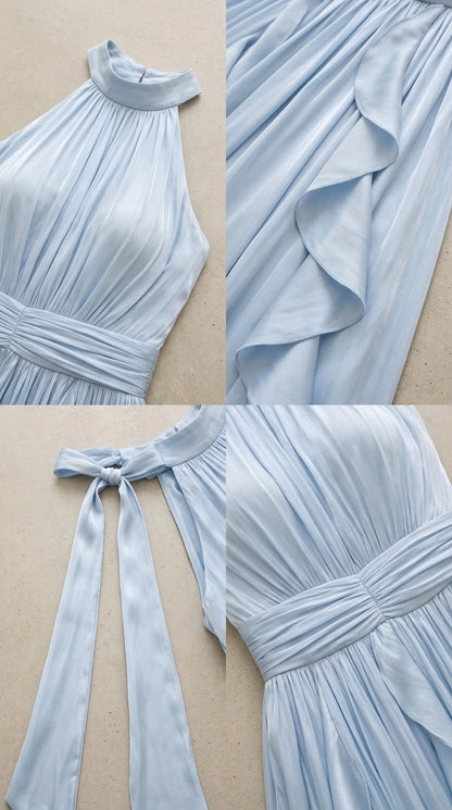 Close-up details of neckline, pleats, ruffles, and back bow