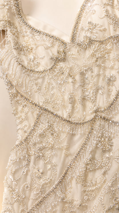 Close-up detail of intricate beadwork and embroidery
