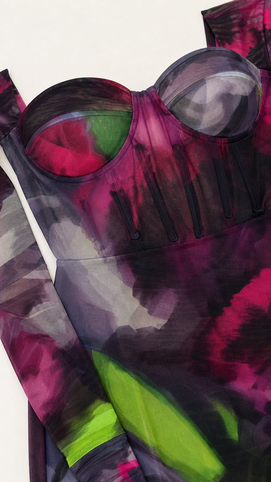 Close-up detail of the structured corset bodice and watercolor print