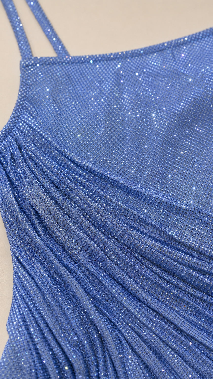 Close-up fabric texture of blue sequin material