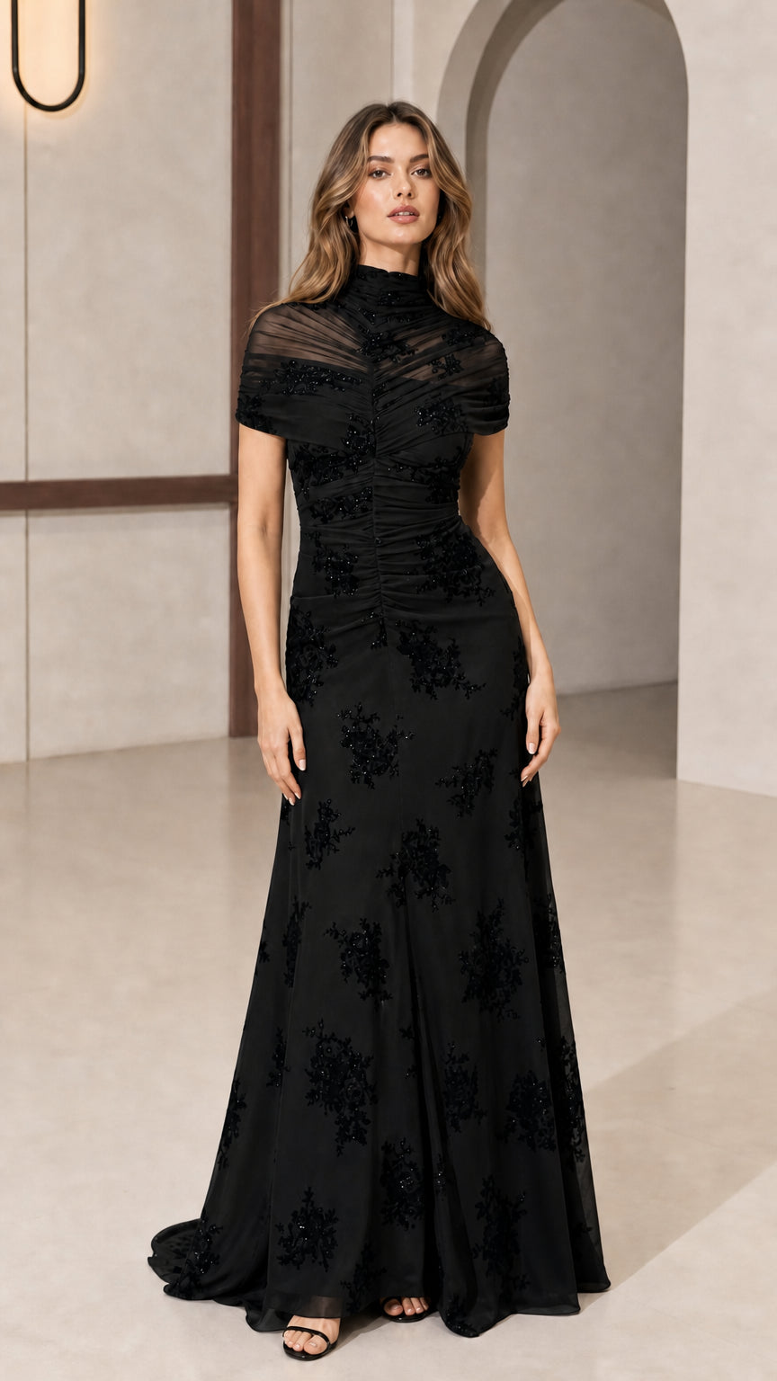 Model wearing black evening gown