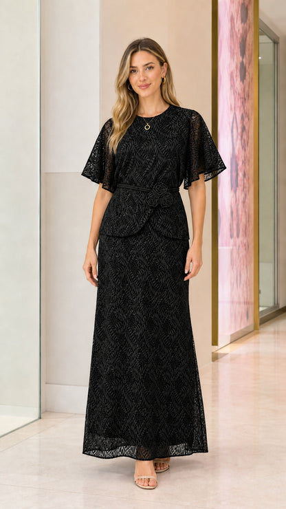 Model wearing black lace maxi dress
