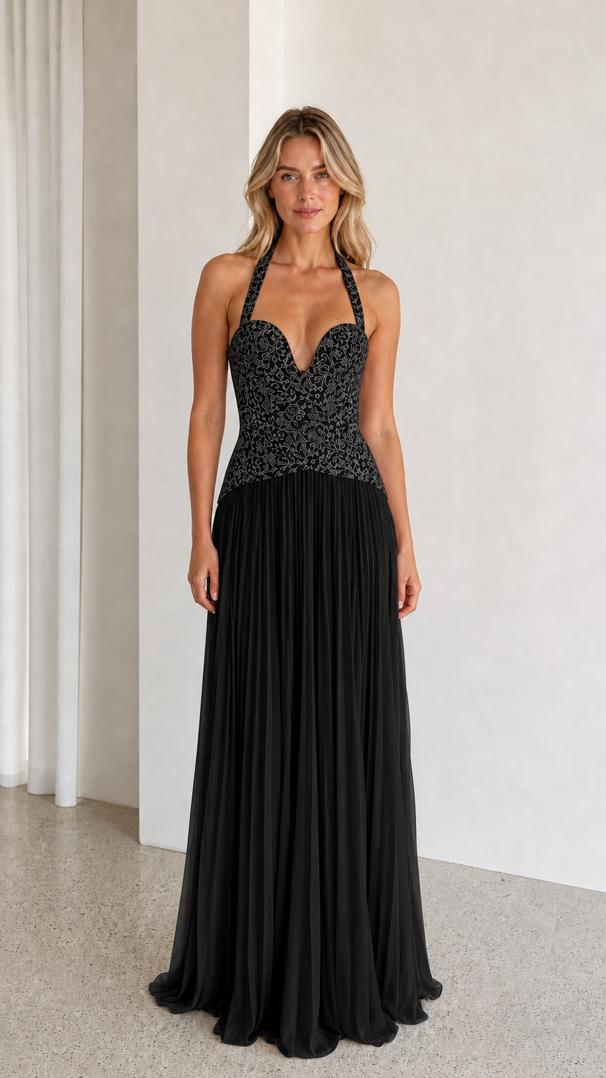 Black halter neck lace and pleated evening gown