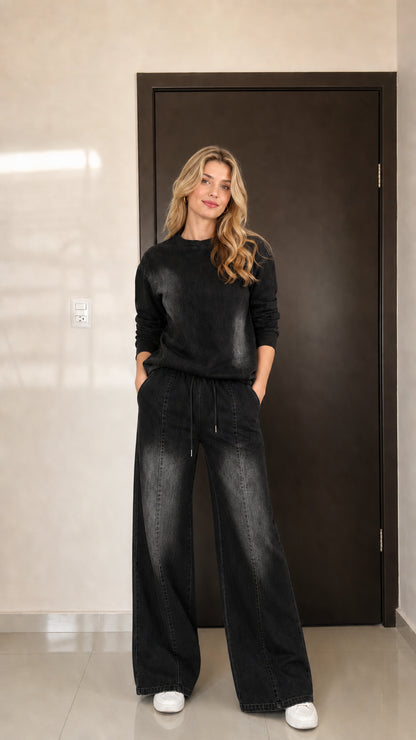 Model wearing the Washed Black wide-leg sweatshirt matching set