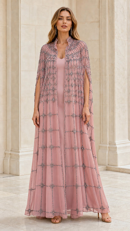 Front view of pink embellished evening cape and gown set