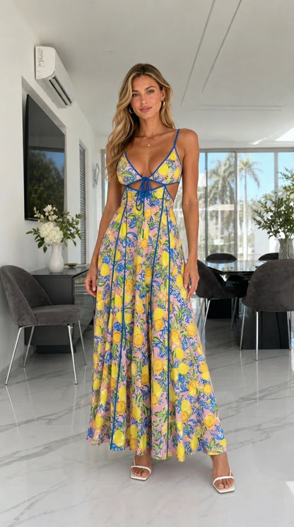 Model wearing pastel multi-color lemon print cutout maxi dress