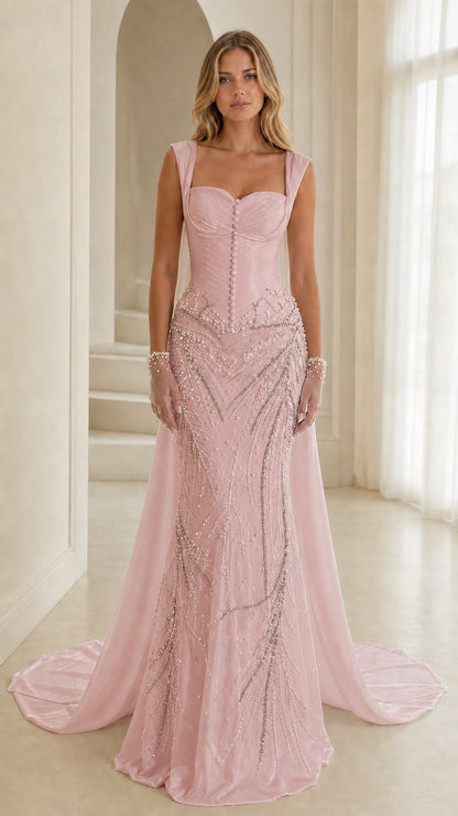 Front view of soft pink beaded formal gown