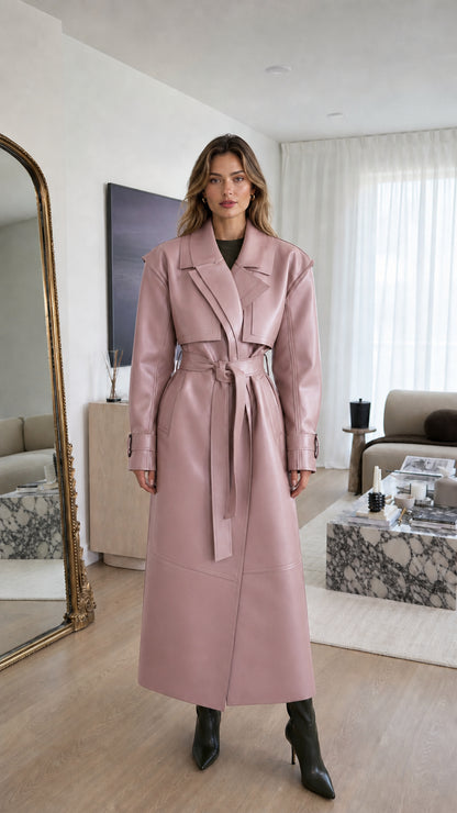 Front view of woman wearing pink faux leather trench coat
