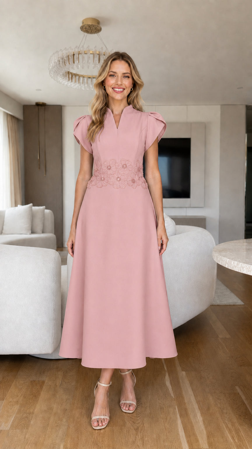 Front view of dusty rose pink tulip sleeve A-line midi dress with beaded waist
