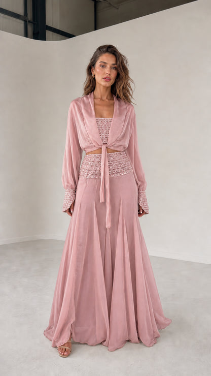 Model wearing pink three-piece chiffon set