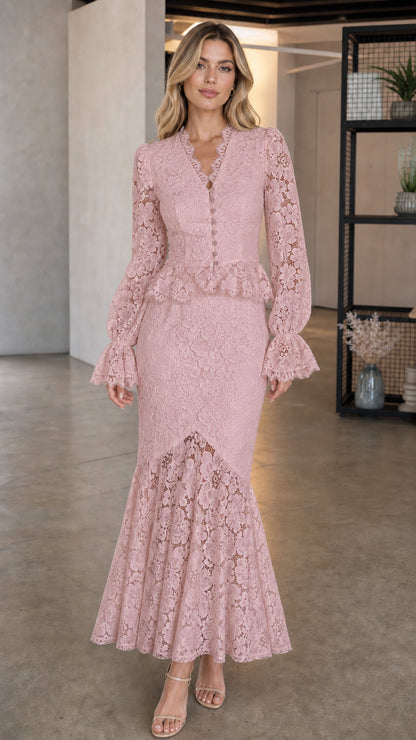 Model wearing pink long-sleeve lace peplum dress