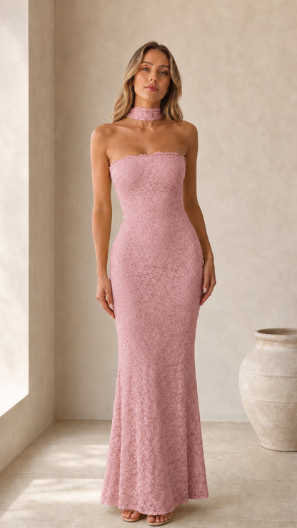 Front view of model wearing pink strapless lace maxi dress