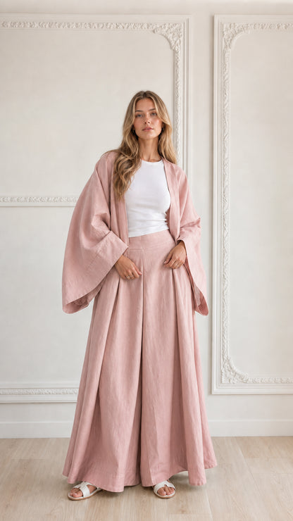 Full-length view of woman wearing dusty pink 2-piece open-front cardigan and pant set