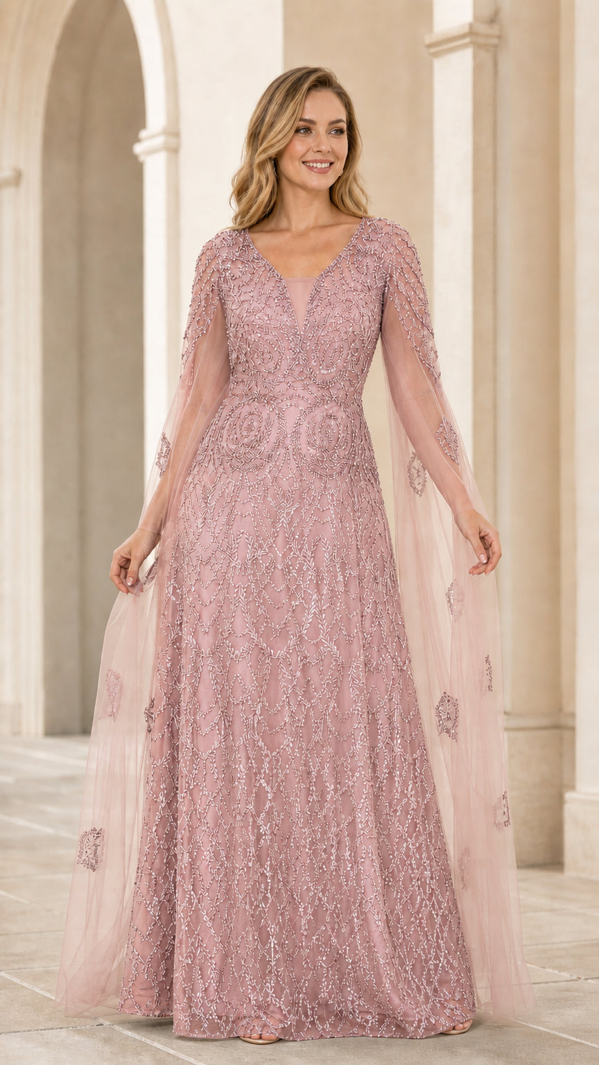 Dusty rose sequined mother of the bride dress with sheer cape sleeves