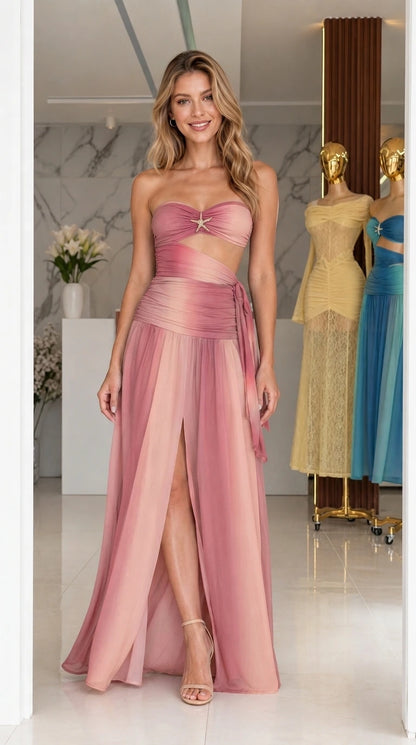 Model wearing pink ombre strapless cutout long dress