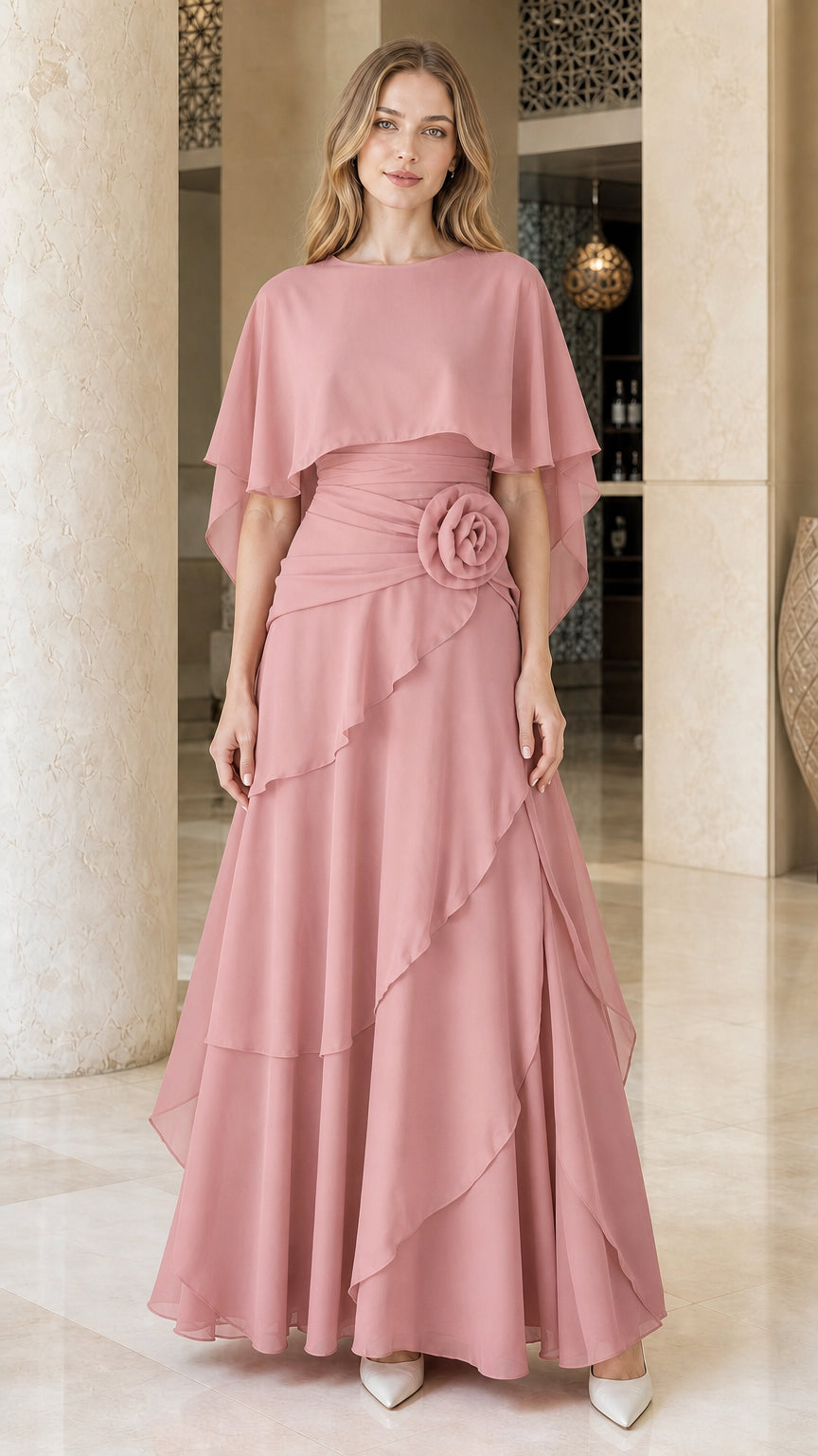 Front view of woman wearing dusty pink chiffon cape formal evening dress