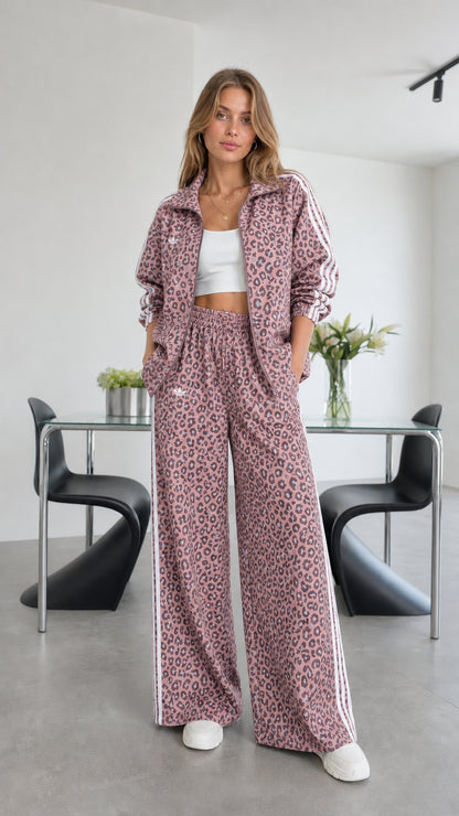 Model wearing pink leopard print track set