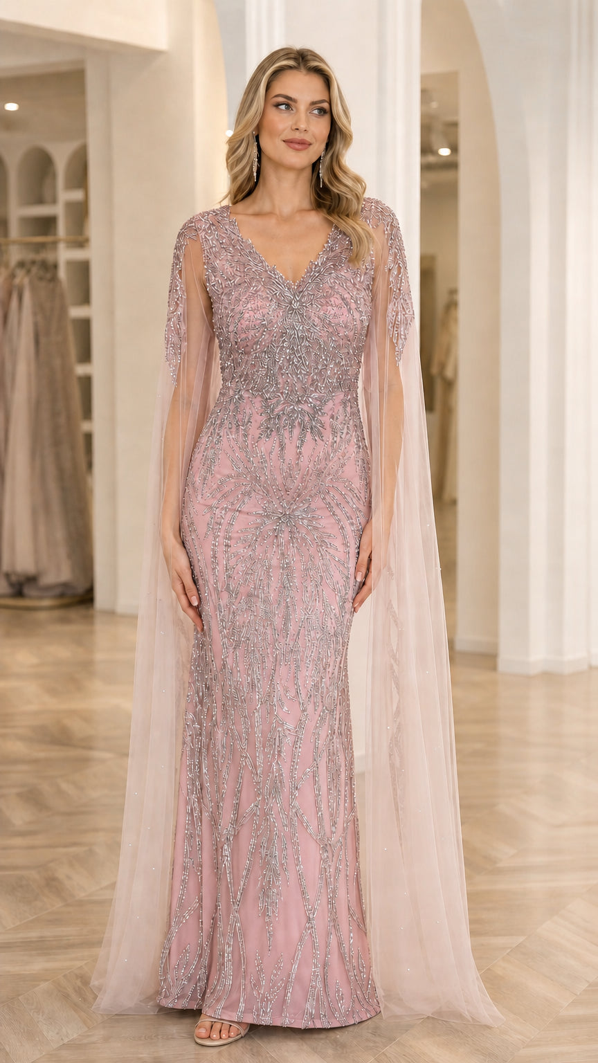 Front view of model wearing Dusty Rose sequin embroidered V-neck formal gown with shoulder cape