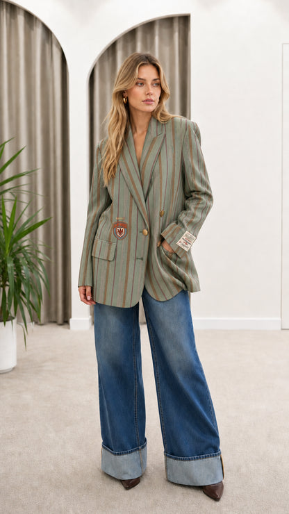 Model wearing Sage Green vertical stripe tailored blazer