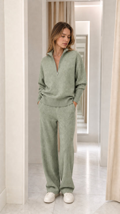 Full-length view of woman wearing sage green two-piece knit lounge set