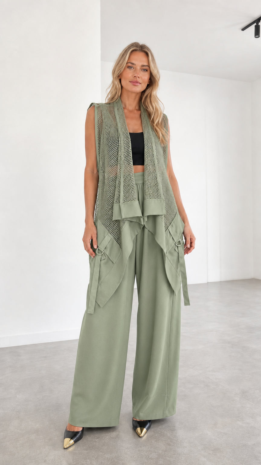 Model wearing sage green two-piece set