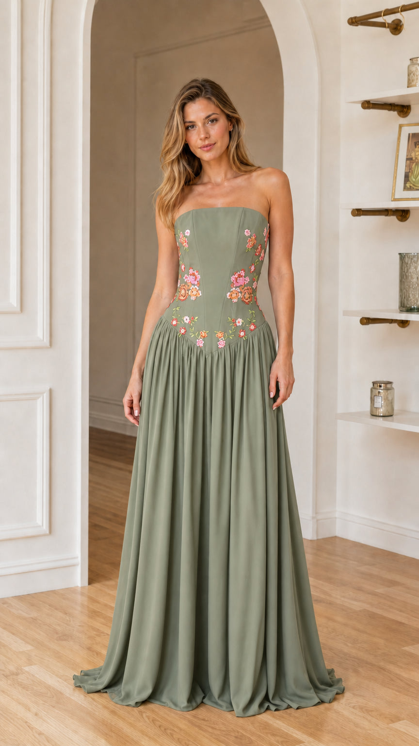 Front view of woman wearing sage green floral embroidered maxi dress