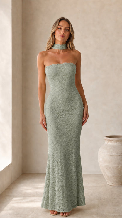 Front view of model wearing sage green strapless lace maxi dress