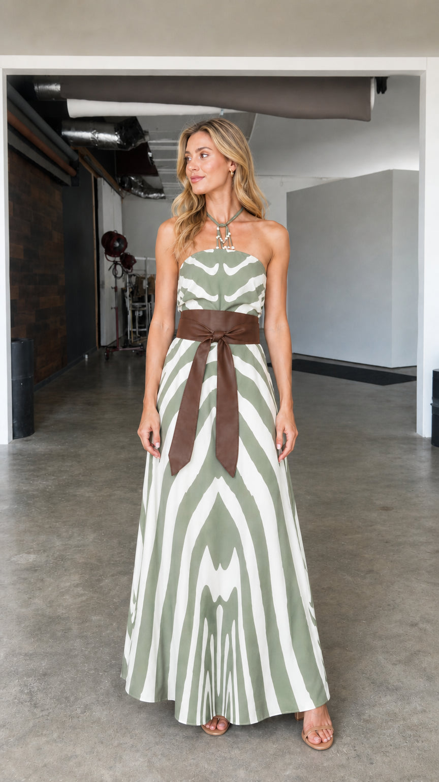 Front full view of green zebra striped halter maxi dress