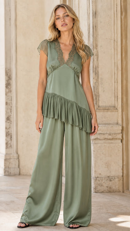 Sage green color variant of the satin ruffle tunic and wide leg pants