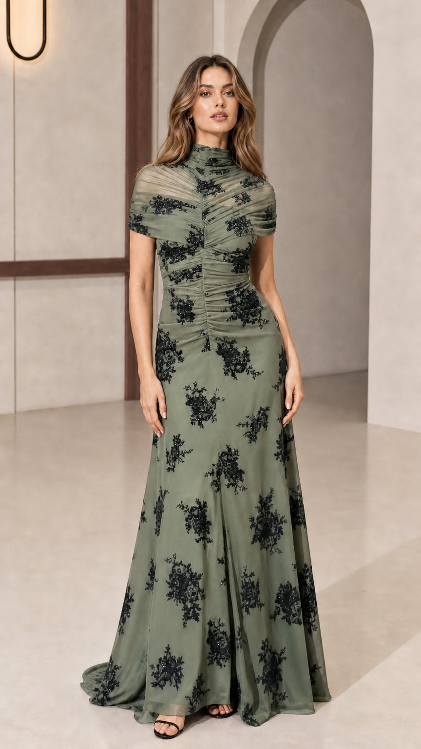 Model wearing sage green evening gown