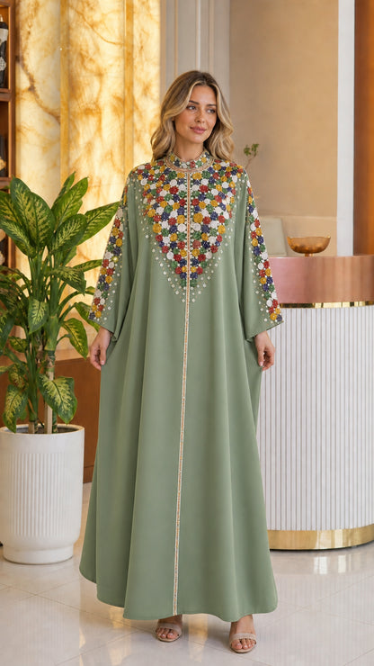 Full front view of sage green flowing embroidered kaftan maxi dress