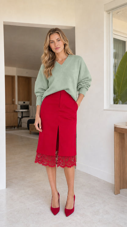Red lace trim front slit midi skirt styled with a sage green relaxed knit sweater