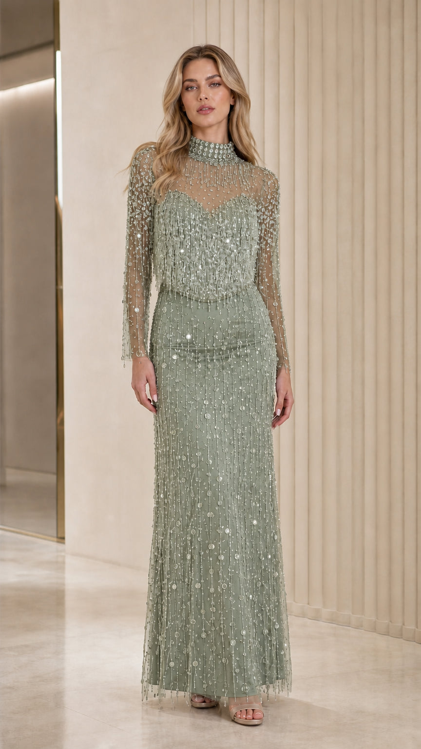 Full length view of sage green beaded formal gown