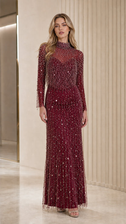 Full length view of burgundy red crystal embellished evening dress